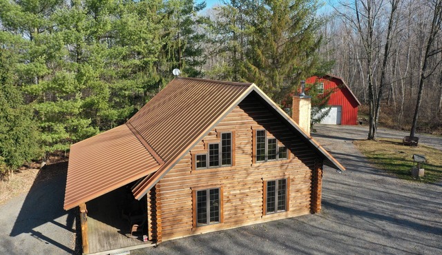 Log cabin secluded on 80 acres