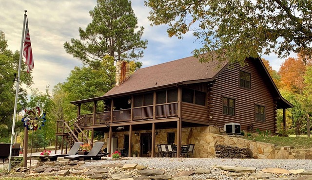 Log cabin with walkout basement and loft located on Ohio River’s edge.