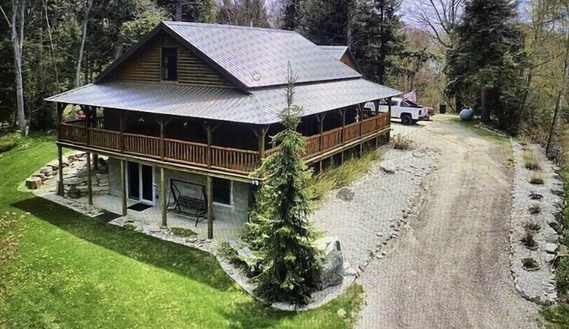 Log Home Located on Lake Muskallonge
