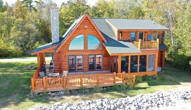 Log Home On Lake Huron Sandy Beach. Located just north of Harrisville Michigan.