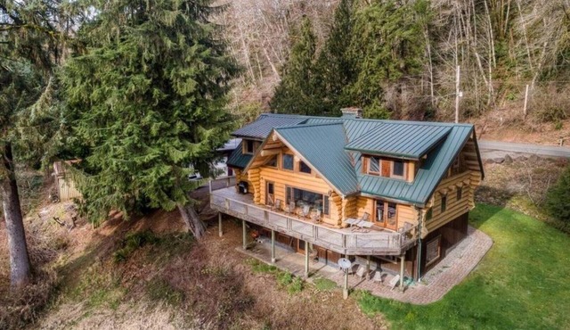 Log Home on Nehalem River 1500sf lower level is all yours. Fish, hike, hunt.