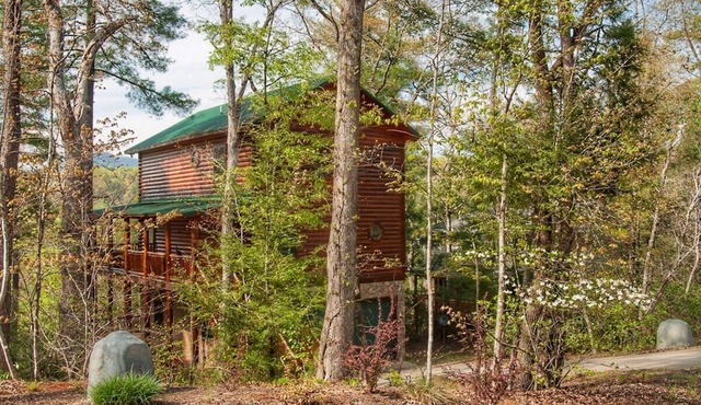 Log home on the river with mountain views