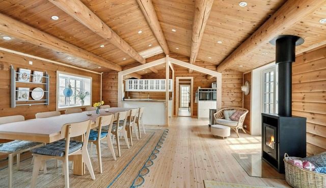 Log house close to the sea and coastal towns