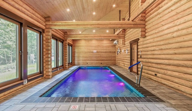 Log House Vacation Rental with Pool and Sauna