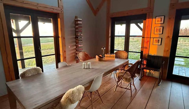 Log house with views of sea fjord and Lemvig