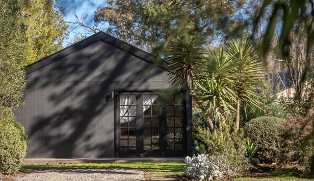 Lomond Cottage Unwind in this charming 1-bedroom hideaway nestled within lush, private gardens. Just