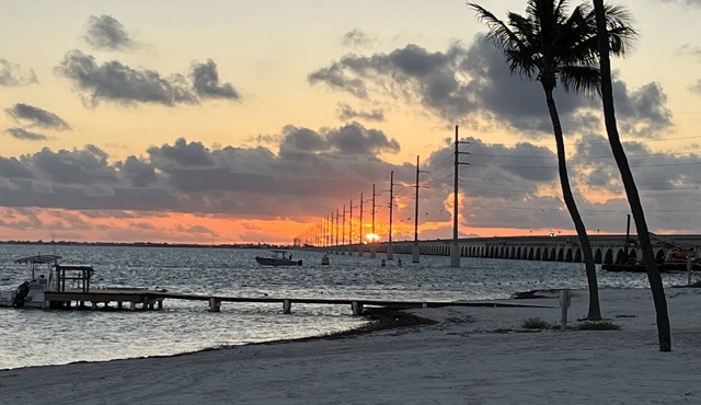 Long Key Condos Oceanfront property with beautiful sandy beach, pool, tennis