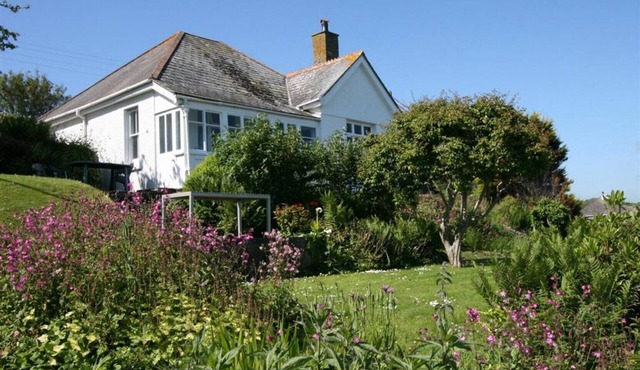 Longships, looks across the cove of Portmellon