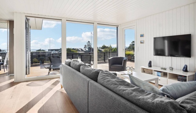 Look forward to a magnificent sea view on vacation in this attractive vacation home. in Børkop