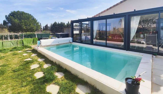 Look forward to this attractive vacation home with conservatory and pool.