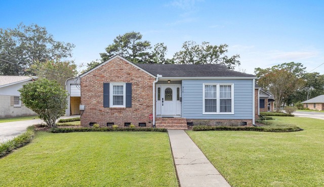 Lou Wilda House is a charming 3 bedroom home with a cozy back patio.