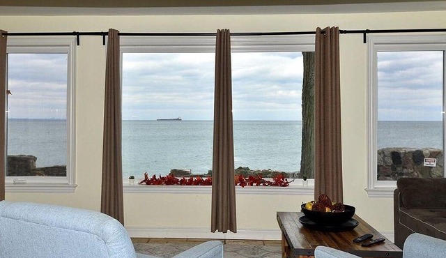Love on the Lake – Romantic Lakefront Updated Cottage with Private Beach