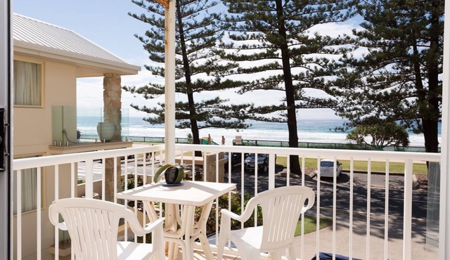 Lovely 2-bedroom beachfront unit with pool