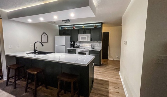 LOVELY 2-BEDROOM CONDO WITH FIREPLACE