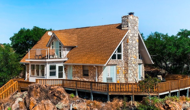 Lovely 2-story home with upper & lower decks, gorgeous lake & Hill Country views