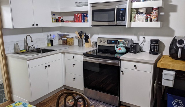 Lovely basement apartment with covered outdoor patio.