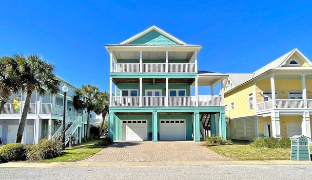 Lovely Double Water Views from this 4 Bedroom Home/Community Pool & Pier!