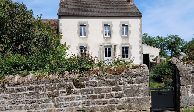 Lovely detached house close to village on enclosed land planted with trees.