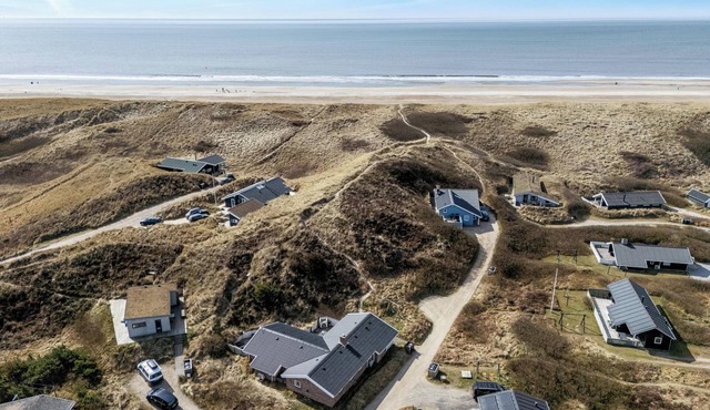 Lovely holiday home with activity room 100 meters from the North Sea in Årgab