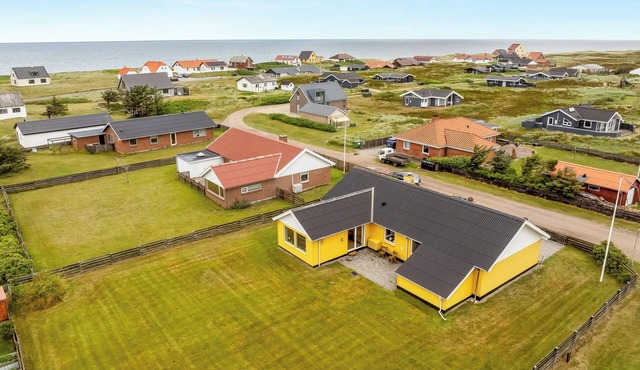 Lovely holiday home with fenced plot, 300 meters from the North Sea in Thy.