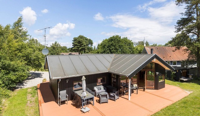 Lovely home in ørsted with sauna