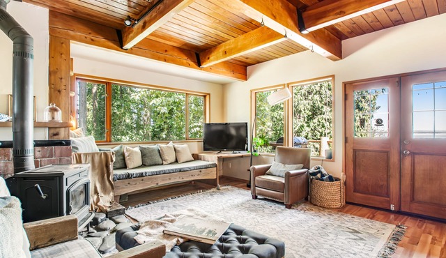 Lovely home overlooking Puget Sound with wood stove, decks & great yard