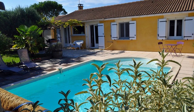 Lovely house with landscaped garden and private pool.