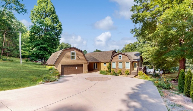 Lovely lakefront home with fire pit, fireplace, dock and gas grill
