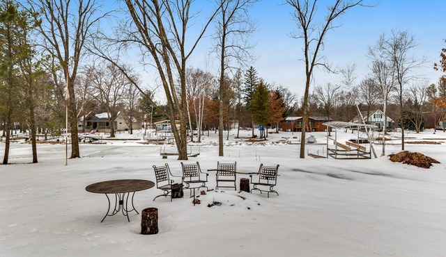 Lovely lakefront home with a game room, firepit, dock & W/D - private beach area