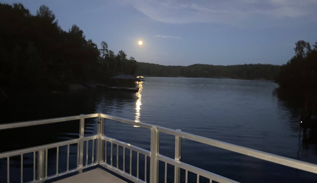 Lovely lakefront home with dock. Summertime stunner. Winter wonderland nearby.