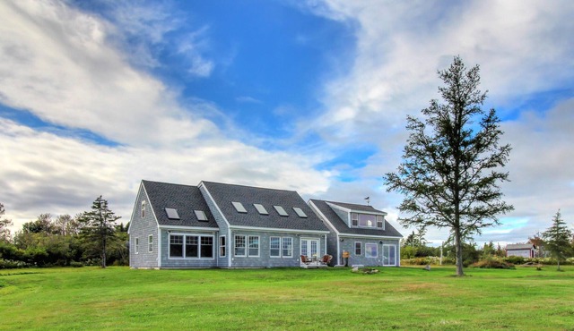Lovely Oceanfront Home with Lighthouse View, Private Hot Tub, and Beach Access