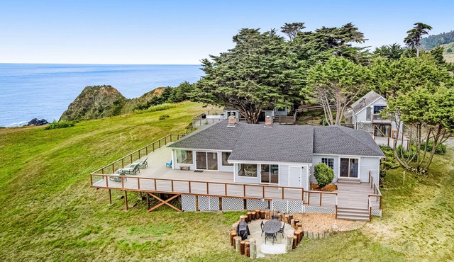 Lovely oceanfront home with large deck, panoramic views, firepit, & W/D