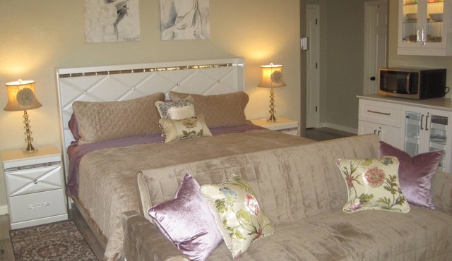 Lovely private master suite with back-yard