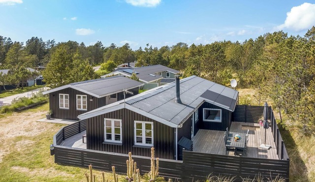 Lovely renovated holiday home, with large enclosed terrace, in Vorupør by the.