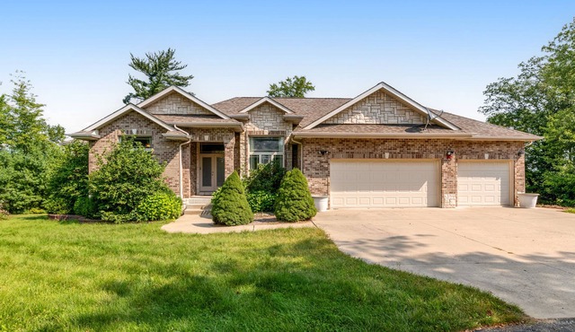 Lovely river-view retreat with big yard, deck, & patio - dog-friendly