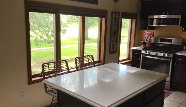 Lovely riverfront destination featuring open concept loft style. Water view.
