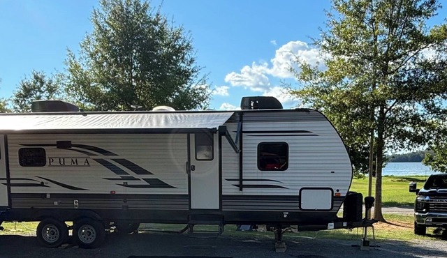 Lovely RV on a secluded and fenced lot. We offer a lot of amenities and add ons