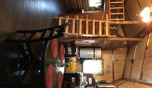 Lovely secluded rustic cabin within waking distance of Rocky Top Winery .