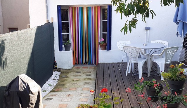 Lovely self contained three bedroom house with private garden.