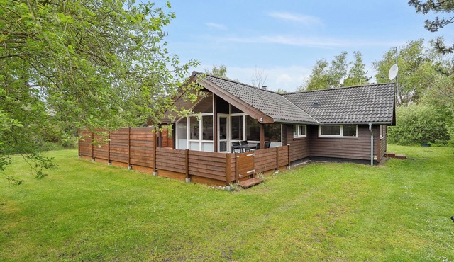Lovely summer house near Rødby with spa sauna