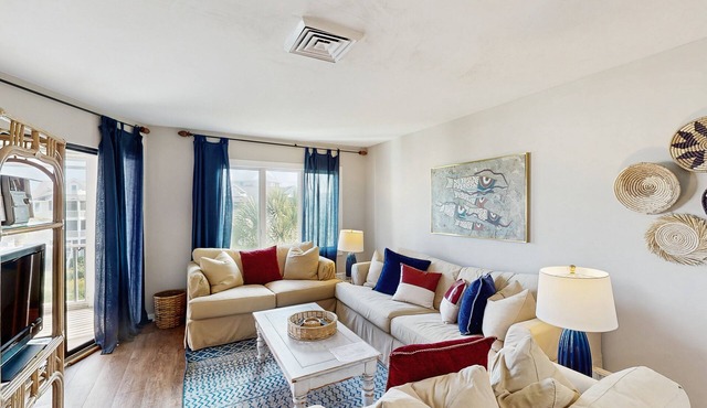 Lovely top floor villa in Wild Dunes with partial ocean views, pool, & W/D