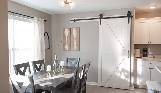 Loves Park Home: 3BR, Garage, King Bed & Family Fun