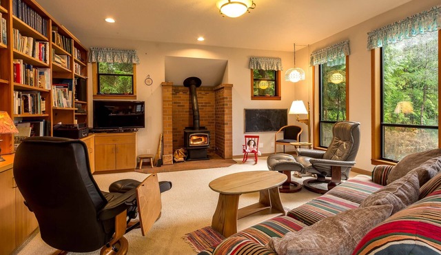 Low bank waterfront on peaceful Fletcher Bay. Perfect for families or reunions.