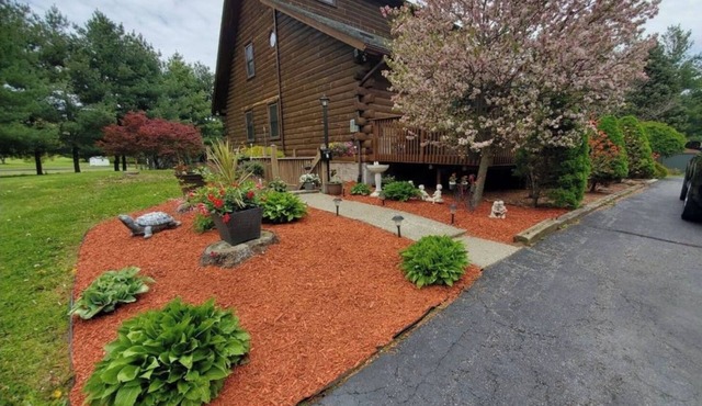 Lower level unit in Spectacular Log Home Estate