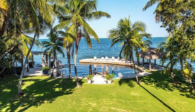 Lush tropical plantings in a gated compound located directly on the Florida Bay