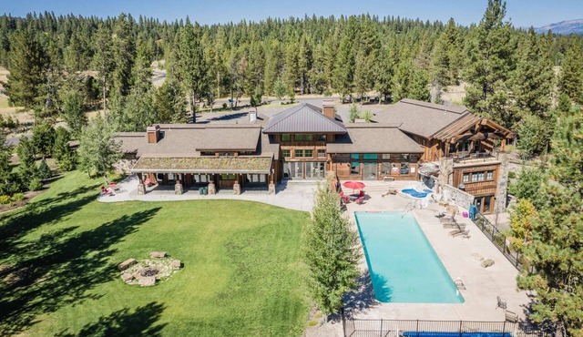 Lux 4 Season Retreat! River Lodge w/Outdoor Pool, Sauna, & Gym! High End Furnishings Throughout!