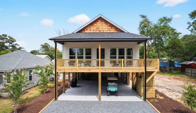 Lux Oak Island Retreat | Walk to Beach | Golf Cart + Private Suite + Fenced Yard!