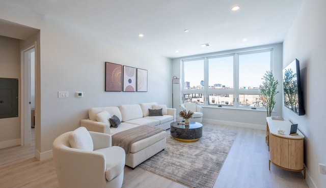 Luxe 2BR Retreat 5-Min PATH to NYC With Rooftop+Gym