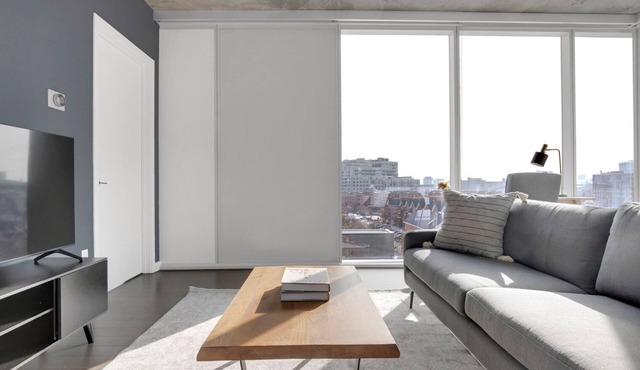 Luxe Near North 2BR w/Roof & Gym, close to Red Line, by Blueground