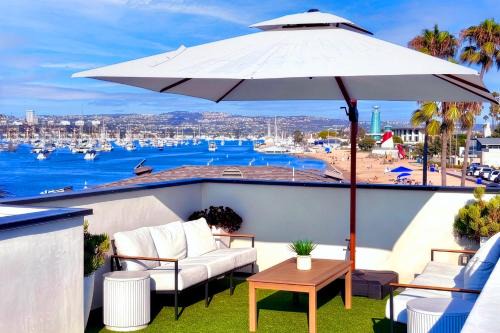 Luxe Ocean View 3BR - Rooftop Deck, Steps to Sand - Rare AC & Garage Parking